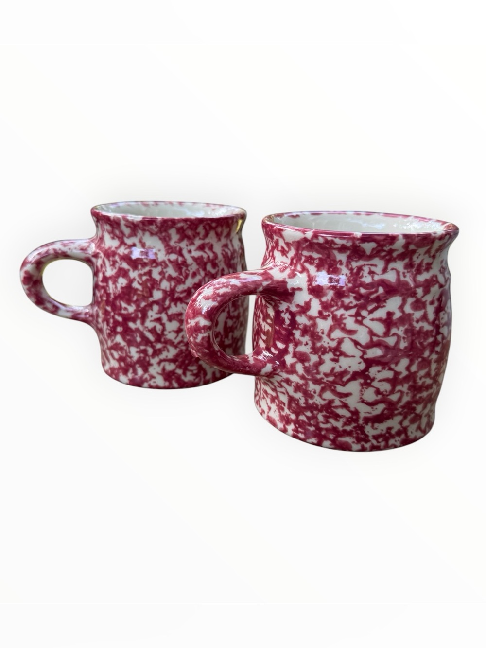 vintage Roseville Ohio pottery mug featuring a pink red spongeware design